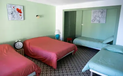 Un ou plusieurs lits dans un hébergement de l'établissement Les Chambres de MARIE