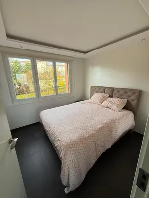 Un ou plusieurs lits dans un hébergement de l'établissement Appartement vue sur Lyon