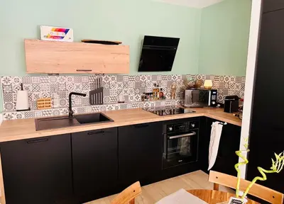 Cuisine ou kitchenette dans l'établissement Appartement cosy au cœur de Montchat- tout confort