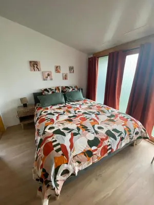 Un ou plusieurs lits dans un hébergement de l'établissement Chalet bois cosy indépendant Saint Jean de Niost