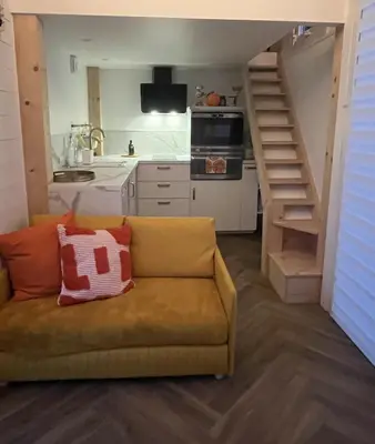 Cuisine ou kitchenette dans l'établissement La Tiny du Rioux