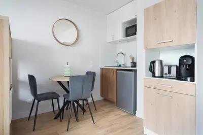 Cuisine ou kitchenette dans l'établissement Le Cocon Lyonnais