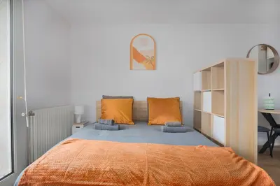 Un ou plusieurs lits dans un hébergement de l'établissement Le Cocon Lyonnais