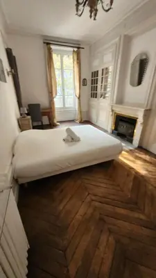 Un ou plusieurs lits dans un hébergement de l'établissement Grand 100 m2 à 5 min de Bellecour
