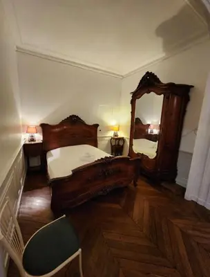 Un ou plusieurs lits dans un hébergement de l'établissement Grand 100 m2 à 5 min de Bellecour