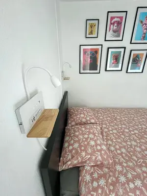 Un ou plusieurs lits dans un hébergement de l'établissement Calm and Cozy Apartment