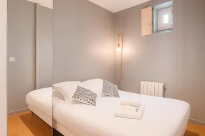 Un ou plusieurs lits dans un hébergement de l'établissement Smartstay Confort - Perrache