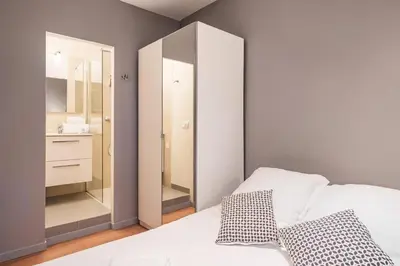 Un ou plusieurs lits dans un hébergement de l'établissement Smartstay Confort - Perrache