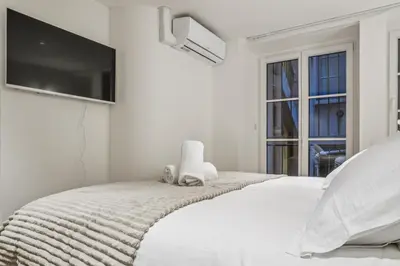 Un ou plusieurs lits dans un hébergement de l'établissement Superbe appartement en hypercentre avec climatisation