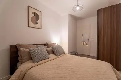 Un ou plusieurs lits dans un hébergement de l'établissement Le Magnifique - Grand balcon - Netflix - Grand Marché
