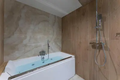 Salle de bains dans l'établissement Spa & Relaxation 15 min de Lyon - Noomi Suite