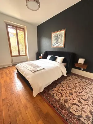 Un ou plusieurs lits dans un hébergement de l'établissement Haussmannian apartment-Close metro