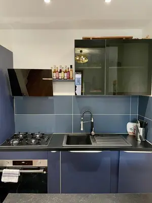 Cuisine ou kitchenette dans l'établissement Haussmannian apartment-Close metro