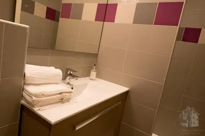 Salle de bains dans l'établissement Le Relais Des Dames