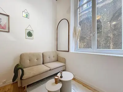 Coin salon dans l'établissement Le BEAU LOUIS