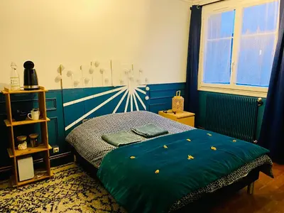Un ou plusieurs lits dans un hébergement de l'établissement Lumineuse chambre proche Gare de Lyon
