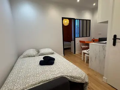 Un ou plusieurs lits dans un hébergement de l'établissement Modern and cozy studio - 4 people Villeurbanne
