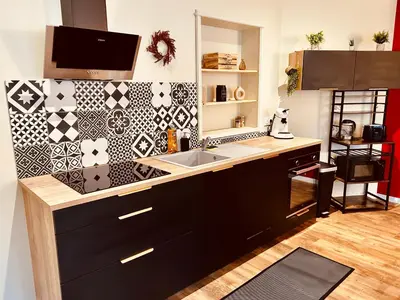 Cuisine ou kitchenette dans l'établissement Chez soi - Apt entier - Choix 1 à 4 chambres avec Sdb privatives - Emplacement #1
