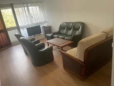 Coin salon dans l'établissement Chambre dans un appartement en colocation