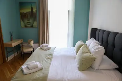 Un ou plusieurs lits dans un hébergement de l'établissement Hôtel Séquoias