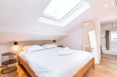 Un ou plusieurs lits dans un hébergement de l'établissement L'appart Breztel & SPA Medipole