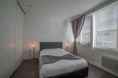 Un ou plusieurs lits dans un hébergement de l'établissement Superbe appartement cosy & design - Lyon 6ème