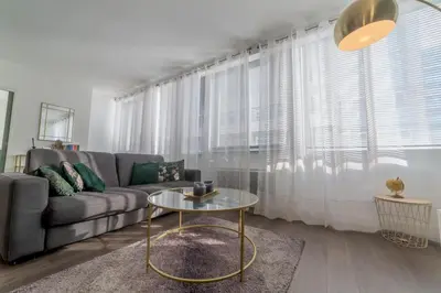 Coin salon dans l'établissement Superbe appartement cosy & design - Lyon 6ème