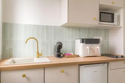 Cuisine ou kitchenette dans l'établissement T3 Lumineux & calme Proche Transports Lyon EST