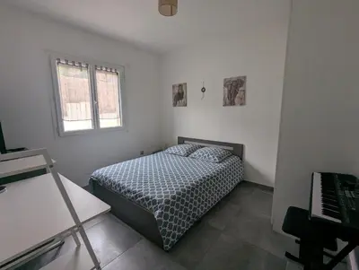 Un ou plusieurs lits dans un hébergement de l'établissement Villa au calme avec vue imprenable