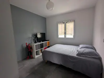 Un ou plusieurs lits dans un hébergement de l'établissement Villa au calme avec vue imprenable