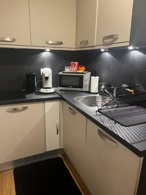 Cuisine ou kitchenette dans l'établissement Douce escale