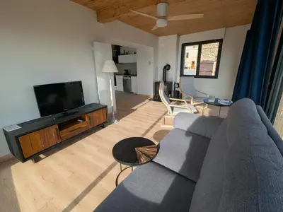Télévision ou salle de divertissement dans l'établissement Gîte du Vieux Cuvage