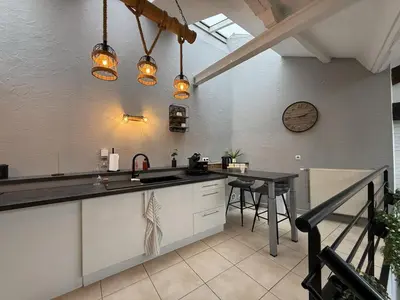 Cuisine ou kitchenette dans l'établissement Loft Des Sens