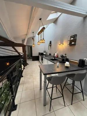 Coin salon dans l'établissement Loft Des Sens