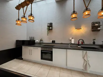 Cuisine ou kitchenette dans l'établissement Loft Des Sens