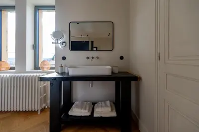 Salle de bains dans l'établissement La Maison et l'Orangerie
