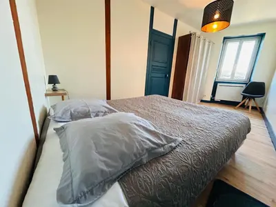 Un ou plusieurs lits dans un hébergement de l'établissement Gîte de l'auberge