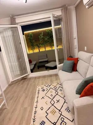 Coin salon dans l'établissement Studio Cosy et élégant avec Terrasse