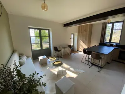Coin salon dans l'établissement Maison bohème chic de 3 suites face à la cité internationale