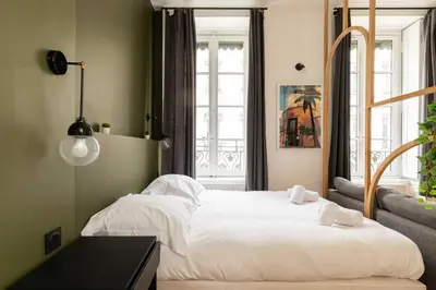 Un ou plusieurs lits dans un hébergement de l'établissement Cosy studio - 2P - Bellecour