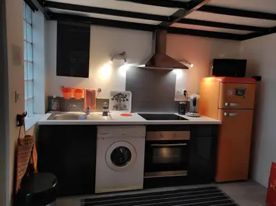 Cuisine ou kitchenette dans l'établissement Loft Jeanne d'Arc
