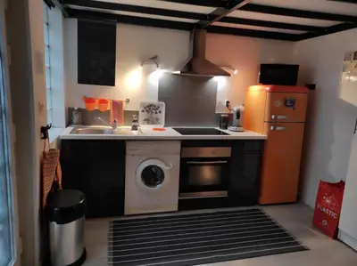 Cuisine ou kitchenette dans l'établissement Loft Jeanne d'Arc
