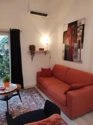 Coin salon dans l'établissement Loft Jeanne d'Arc