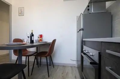 Cuisine ou kitchenette dans l'établissement La Case de Jade