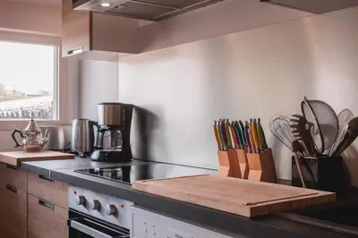Cuisine ou kitchenette dans l'établissement Gîte de la Ruche - 15 personnes