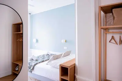 Un ou plusieurs lits dans un hébergement de l'établissement Charming apartment- 3BR-5P- Quai du Rhone