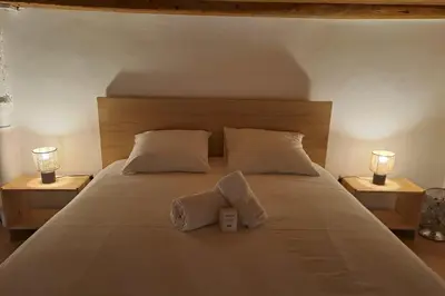 Un ou plusieurs lits dans un hébergement de l'établissement Studio spacieux entièrement refait à neuf en plein centre-ville