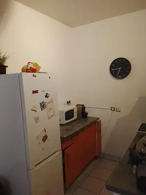 Cuisine ou kitchenette dans l'établissement Appartement T2