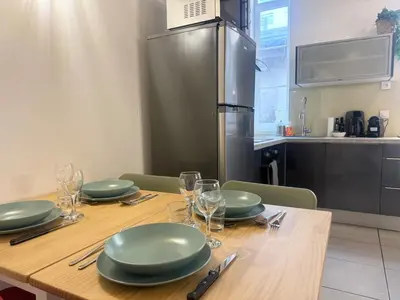 Cuisine ou kitchenette dans l'établissement Jubin Duplex
