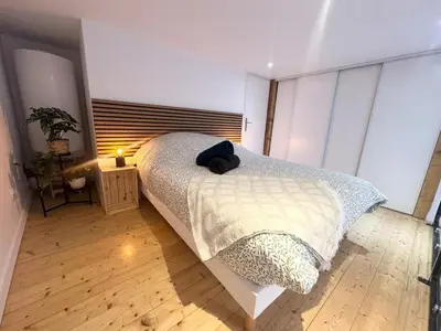 Un ou plusieurs lits dans un hébergement de l'établissement Jubin Duplex